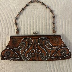 Chic Brown Wristlet with Sleek Design